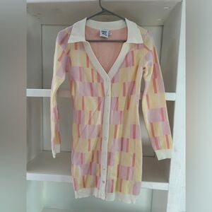 Princess Polly Sweater Dress in pastel pink and yellow.